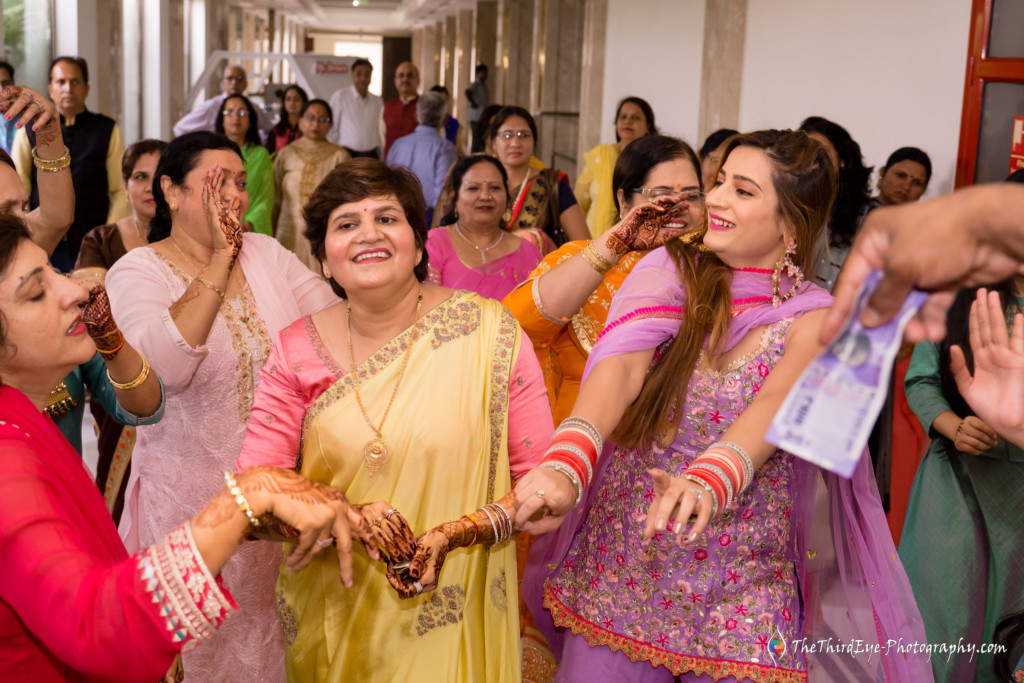 Top-10-Best-Candid-wedding-photographer-big-fat-north-indian-destination-wedding-haldi-ceremony-photography-lucknow-ramada-dance