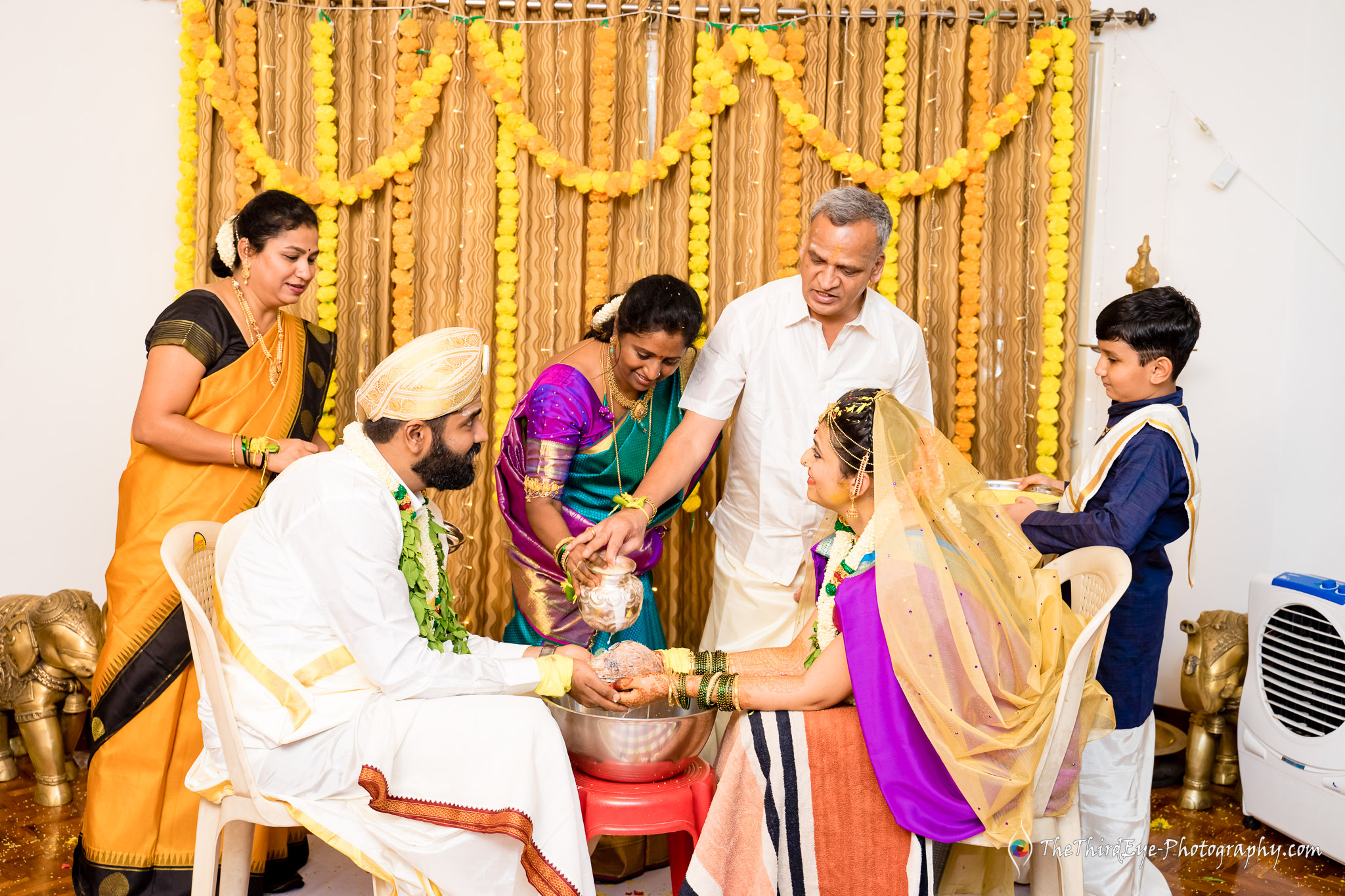 Blessings-parents-water-milk-ritual-desi-Best-indian-wedding-photographer-top-wedding-photographers-Wed-me-good-TTEP_CM_25_A7009328